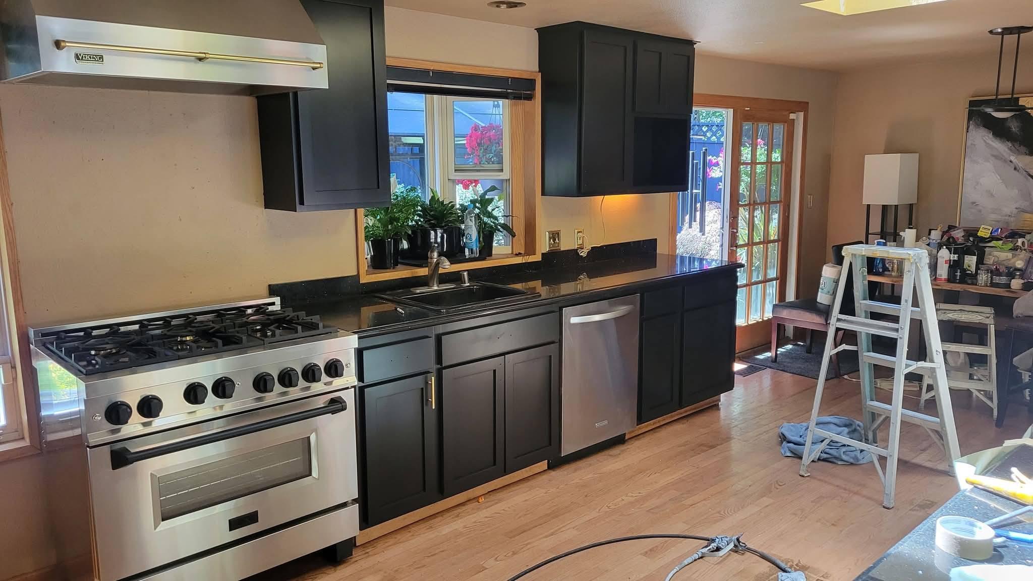 Lane HBS team at work — kitchen cabinet painting